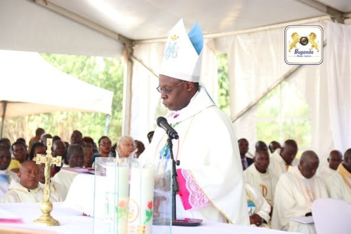 Rt. Rev. Lawrence Mukasa, Bishop of Kasana-Luweero Diocese, delivers his speech during the 125th anniversary celebrations of Our Lady of Grace Church in Nandere, Bulemeezi